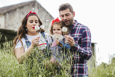 Young family enjoying nature - LJF00625