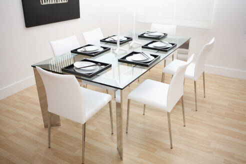 Set table and chairs in modern dining room - BLEF13955