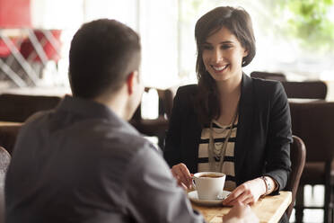 Couple drinking coffee in cafe - BLEF14042