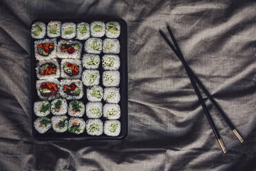 Close up of tray of sushi rolls - BLEF14429