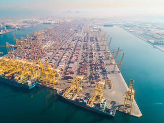 Aerial view of gigantic cargo port full of containers, Dubai, U.A.E. - AAEF01886