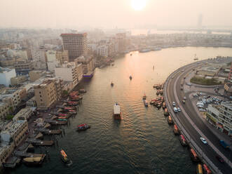 DUBAI, UNITED ARAB EMIRATES - 10 JUNE 2018: Aerial view of navigable river crossing suburbs, Dubai, U.A.E. - AAEF01890