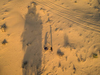 Aerial creative view of a marriage proposal in the middle of the desert in Dubai, U.A.E. - AAEF01947