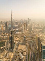 Aerial panoramic view of Dubai skyscrapers, roads and Burj Khalifa Tower,UAE. - AAEF02347
