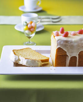 Lemon cake with Easter decoration on table - PPXF00242