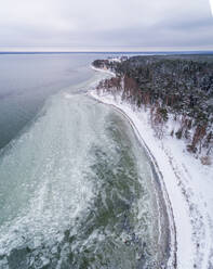 Aerial view of the frozen sea on the coast of Kasmu in Estonia. - AAEF02457