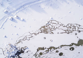 Abstract aerial view of the frozen sea of Muraste in Estonia. - AAEF02496