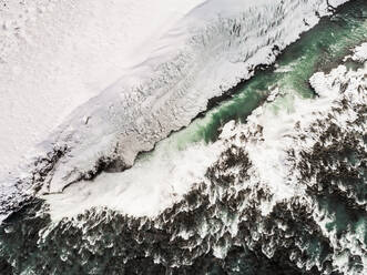 Abstract aerial view of the Ölfusá river in winter in Iceland. - AAEF03081