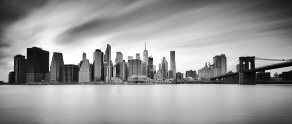 Lower Manhattan skyline and Brooklyn Bridge, New York City, New York, United States of America, North America - RHPLF00733