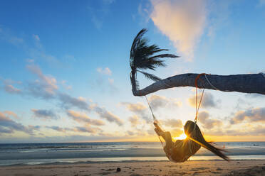 Girl in hammock on Sugar Beach, Bantayan Island, Cebu, The Visayas, Philippines, Southeast Asia, Asia - RHPLF00875