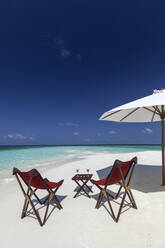 Martini and chairs on the beach, Maldives, Indian Ocean, Asia - RHPLF00905