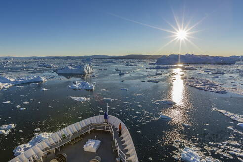 Expeditions ship amongst huge icebergs, Ilulissat, Greenland, Polar Regions - RHPLF00942