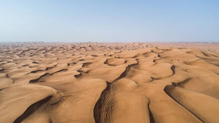 Aerial view of people driving quad bikes in the sand dunes of Al Bedayer desert in Sharjah, U.A.E. - AAEF03150