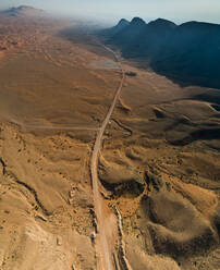 Aerial view of an empty road in the Sharjah desert, U.A.E. - AAEF03160