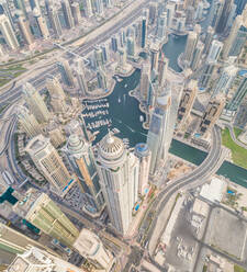 Aerial view of Towers surrounding harbour in Dubai Marina, U.A.E. - AAEF03177