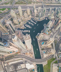 Aerial view of Towers surrounding harbour in Dubai Marina, U.A.E. - AAEF03178