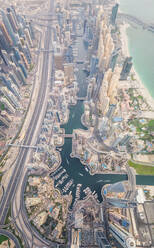 Aerial view of Towers surrounding harbour in Dubai canal, U.A.E. - AAEF03181