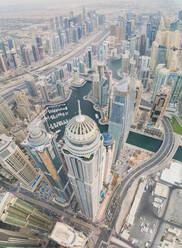 Aerial view of Towers surrounding harbour in Dubai Marina, U.A.E. - AAEF03187