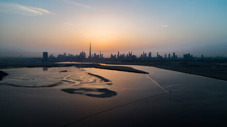 Aerial view of Dubai skyscrapers at sunset, United Arab Emirates. - AAEF03279