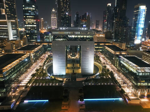 Aerial view of The Dubai International Finance Center at night, United Arab Emirates. stock photo