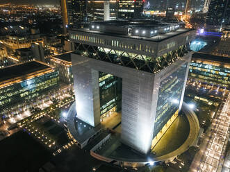 Aerial view of The Dubai International Finance Center at night, United Arab Emirates. - AAEF03334