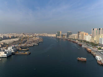 Aerial view of boats in Dubai canal in United Arab Emirates. - AAEF03335