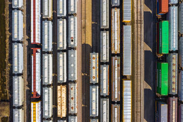 Aerial view of rail cars waiting at a staging railyard station in Aurora, IL - USA - AAEF03412