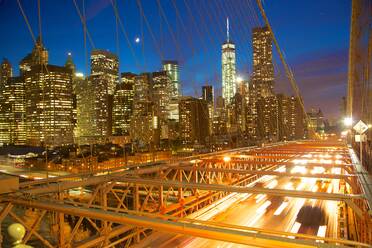 Manhattan skyline from the Brooklyn Bridge at night, New York, United States of America, North America - RHPLF01111