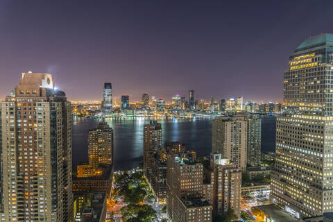 Lower Manhattan and Jersey City in New Jersey across Hudson River, New York, United States of America, North America stock photo