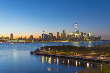 Manhattan, Lower Manhattan and World Trade Center, Freedom Tower in New York across Hudson River overlooking Pier A Park, Hoboken, New Jersey, United States of America, North America - RHPLF01329