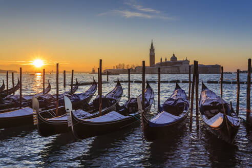 Venetian winter sunrise after snow with gondolas, San Giorgio Maggiore and Lido, Venice, UNESCO World Heritage Site, Veneto, Italy, Europe - RHPLF01375