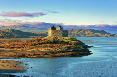 Castle Tioram on the coastal island Eilean Tioram where River Shiel and Loch Moidart meet, at low tide on a sunny winter morning, Highlands, Scotland, United Kingdom, Europe - RHPLF01484