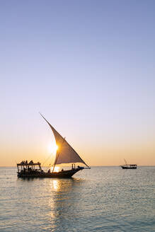 Tourists on a sunset cruise on the Indian Ocean, Nungwi, Island of Zanzibar, Tanzania, East Africa, Africa - RHPLF01561