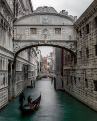 Gondolas under Bridge of Sighs in Venice, Italy, Europe - RHPLF01674