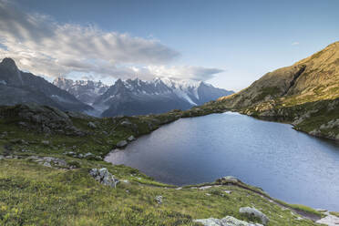 Sunrise on the snowy peaks of Mont Blanc massif seen from Lacs De Cheserys, Chamonix, Haute Savoie, French Alps, France, Europe - RHPLF01819