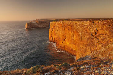 Cliff coast at sunset, Cabo de Sao Vicente, Sagres, Algarve, Portugal, Europe - RHPLF02084