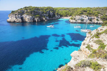 View of Cala Macarelleta and sailboats, Menorca, Balearic Islands, Spain, Mediterranean, Europe - RHPLF02356