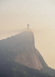 Christ the Redeemer and Corcovado Mountain at sunrise, Rio de Janeiro, Brazil, South America - RHPLF02439