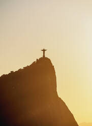 Christ the Redeemer and Corcovado Mountain at sunrise, Rio de Janeiro, Brazil, South America - RHPLF02445