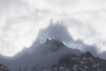 Shapes above peaks created by mist, Cime Del Largo, Bregaglia Valley, Canton of Graubunden (Grisons), Switzerland, Europe - RHPLF03234