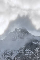 Shapes above peaks created by mist, Cime Del Largo, Bregaglia Valley, Canton of Graubunden (Grisons), Switzerland, Europe - RHPLF03235