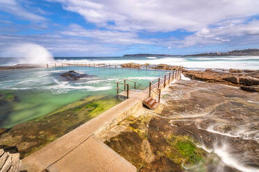 North Curl Curl Rockpool at beach against sky, Sydney, Australia - SMAF01332