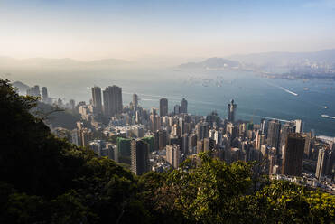 View over Victoria Harbour at sunset, seen from Victoria Peak, Hong Kong Island, Hong Kong, China, Asia - RHPLF03597