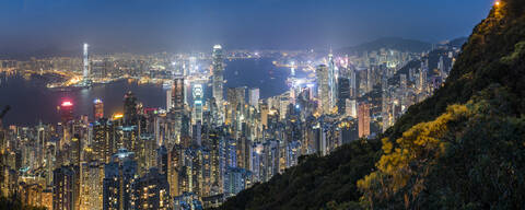 View over Hong Kong Island, Victoria Harbour and Kowloon at night, seen from Victoria Peak, Hong Kong, China, Asia stock photo