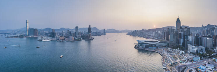 View over Victoria Harbour and Hong Kong at sunset, China, Asia - RHPLF03603