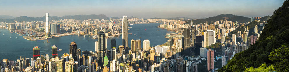 View across Victoria Harbour, from Hong Kong Island to Kowloon, seen from Victoria Peak, Hong Kong, China, Asia - RHPLF03605