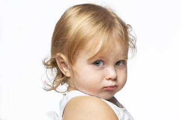 Portrait of pouting blond girl, white background - VGF00278