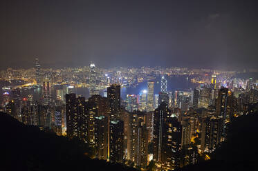 View at night of central Hong Kong and Victoria Harbour from Victoria Peak, looking toward Kowloon in background, Hong Kong, China, Asia - RHPLF03630