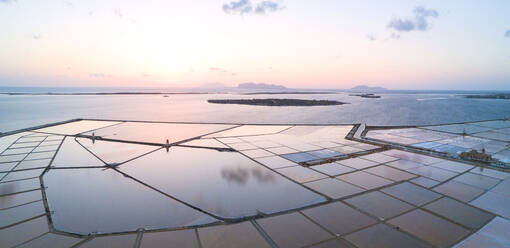 Aerial view of Saline dello Stagnone at sunset, Marsala, province of Trapani, Sicily, Italy, Mediterranean, Europe (Drone) - RHPLF03858