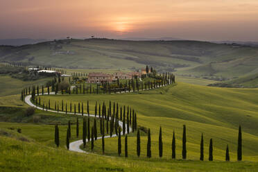 Sunset over the Agriturismo Baccoleno near Asciano in Tuscany, Italy, Europe - RHPLF04053